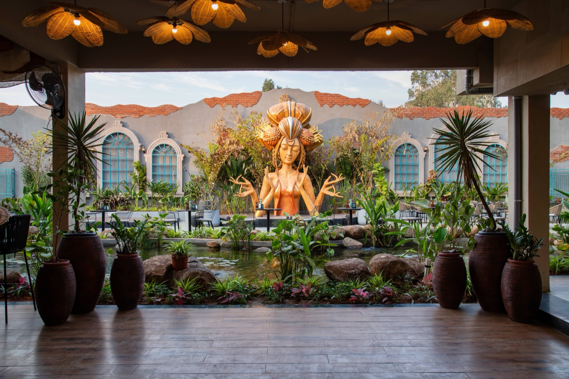 Golden lotus-light dining pavilion at Nusa